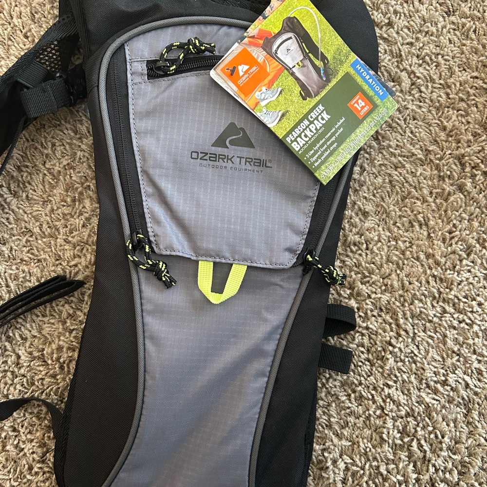 Ozark Trail Black and Gray Backpack with Yellow Accents